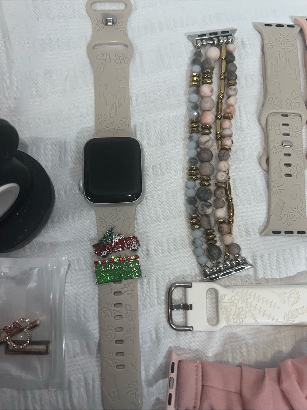 Apple Watch with Beige Sport Band and Beaded Bracelet Accent